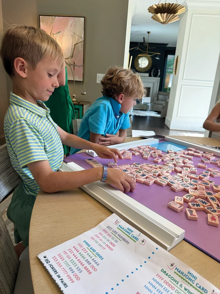 Kids playing mahjong