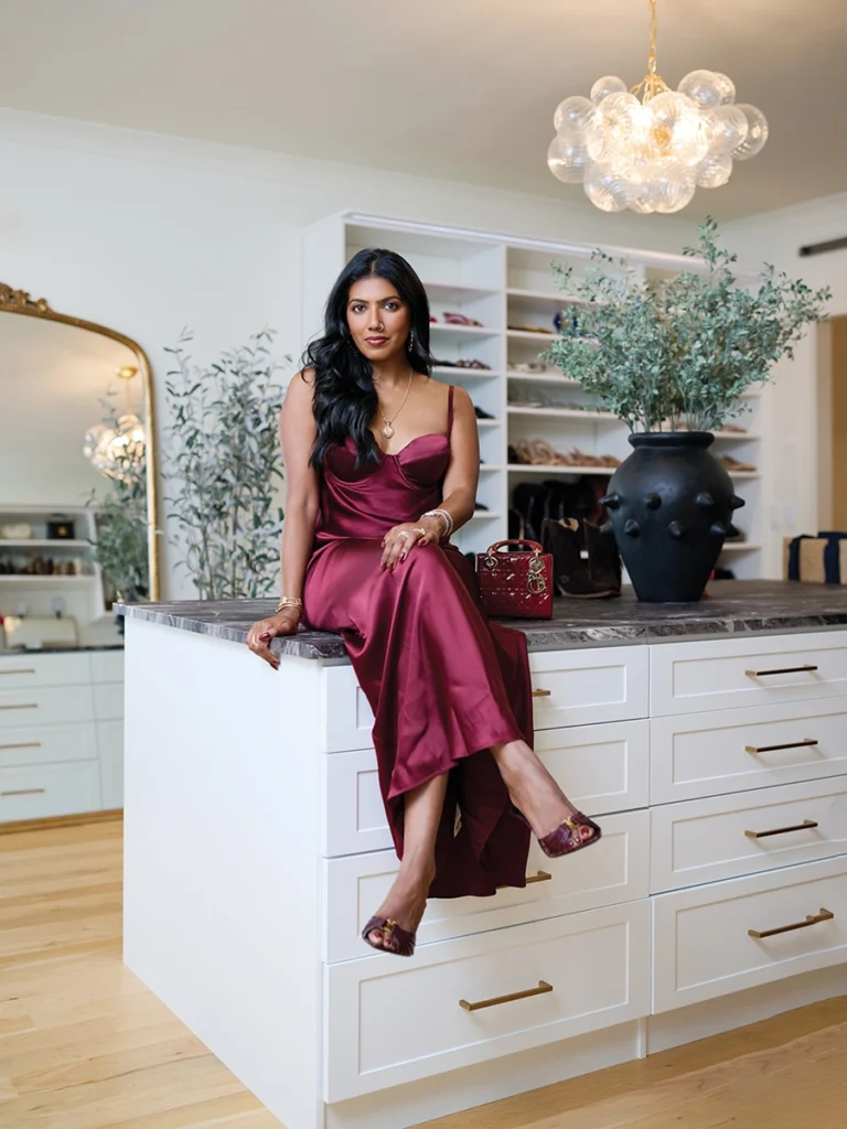 Vidya Gopalan sitting in her closet