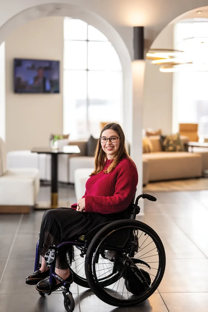 Lifelong Charlottean Rebecca Combs in a wheelchair